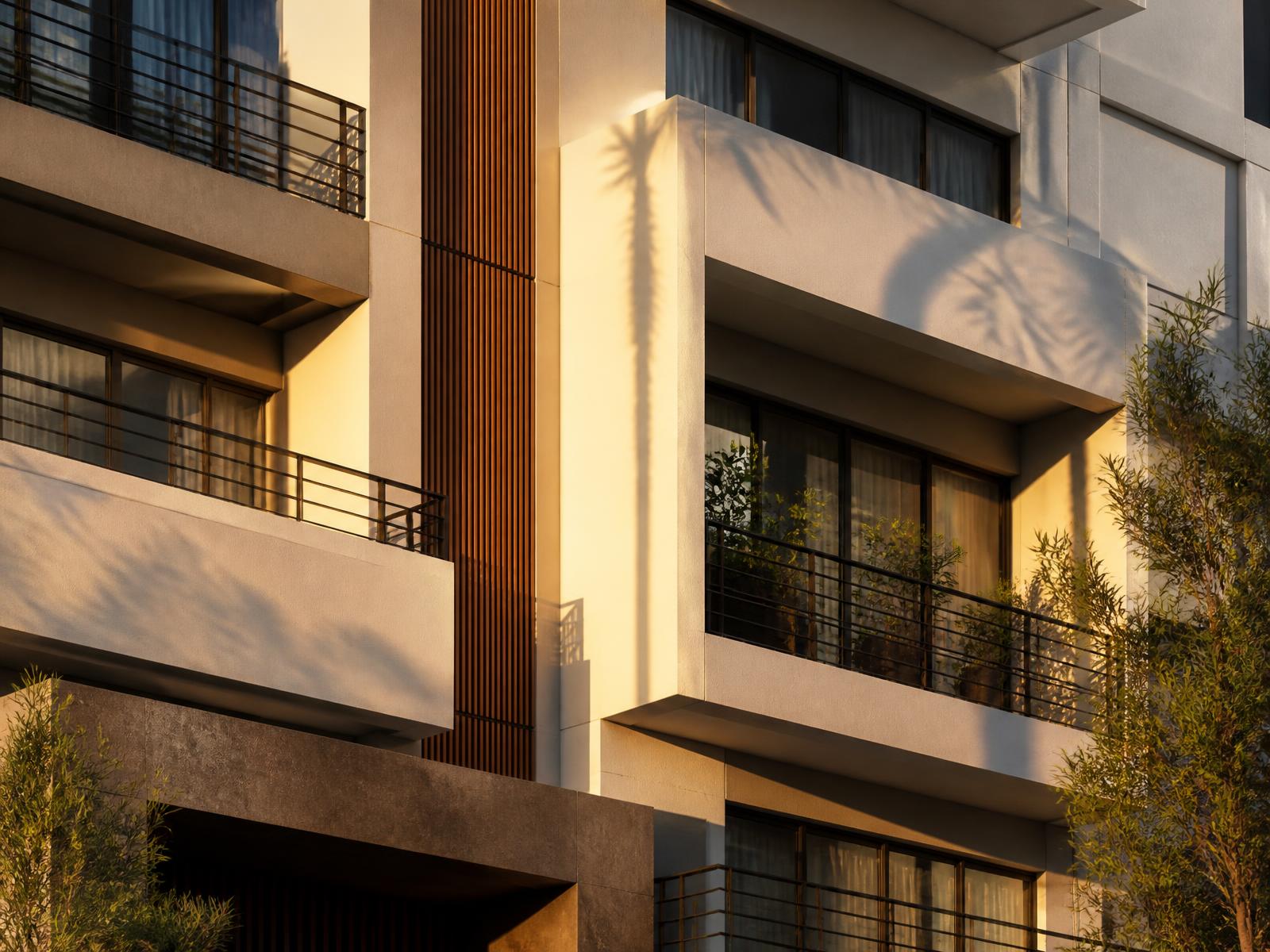 Modern Los Angeles apartment building facade in late afternoon light